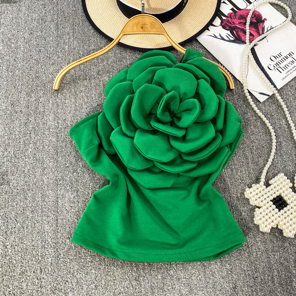 Top Cosima verde cu umar gol si floare tridimensionala