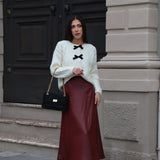 Jerseu Sabriel din tricot cu inchidere prin nasturi cu fundite