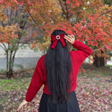 Jerseu Sabriel din tricot cu inchidere prin nasturi cu fundite