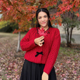 Jerseu Sabriel din tricot cu inchidere prin nasturi cu fundite