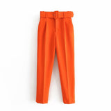 Pantaloni Stezzia portocalii conici accesorizati cu o curea