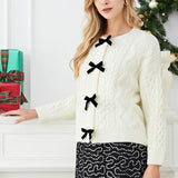 Jerseu Sabriel din tricot cu inchidere prin nasturi cu fundite