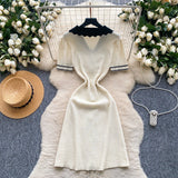 Rochie Eranthe crem din tricot cu guler lat si nasturi decorativi