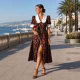 Rochie midi Solita negru din voal cu guler lat in V, maneci scurte, imprimeu floral