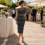 Rochie Arabela neagra cu broderie florala, captuseala si banda aurie tip curea in talie