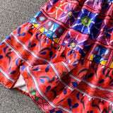 Rochie Cordelia rosie cu imprimeu deosebit brodat si bretele reglabile