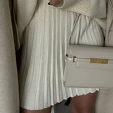 Set tricotat Lirra - compus din bluza si fusta cu pliuri