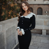Rochie Asimera neagra din tricot cu guler lat si nasturi perlute