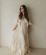 Rochie midi Aylora cu volanase si decolteu adanc