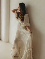 Rochie midi Aylora cu volanase si decolteu adanc