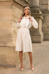 Rochie Silvy albastra cu imprimeu floral si decolteu accesorizat cu nod