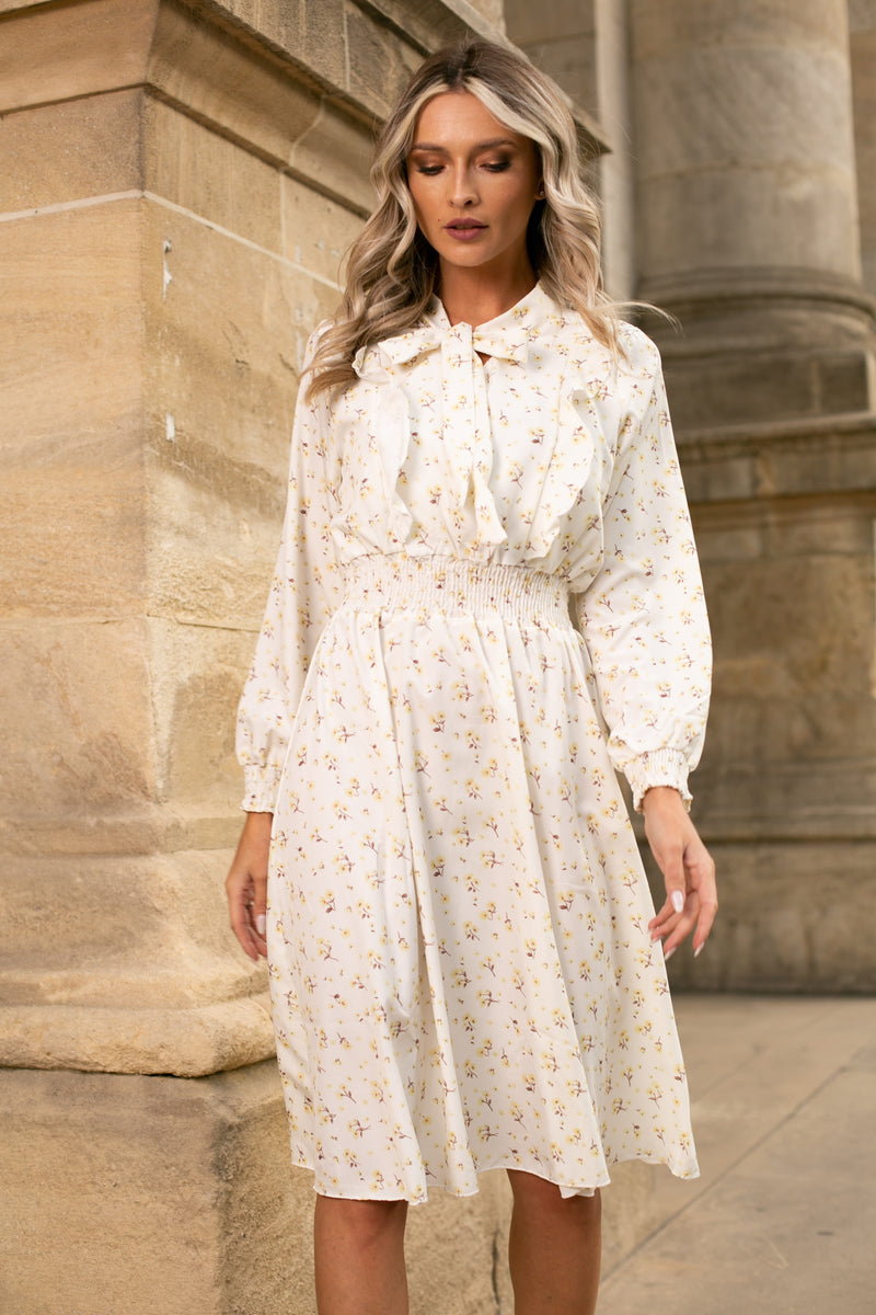 Rochie Silvy alba cu imprimeu floral si decolteu accesorizat cu nod