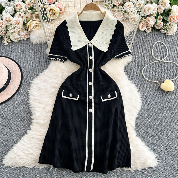 Rochie Eranthe neagra din tricot cu guler lat si nasturi decorativi
