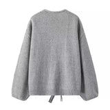 Cardigan Kerina tricotat cu inchidere prin fundite