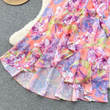 Rochie Gina portocalie cu decolteu in V si imprimeu floral