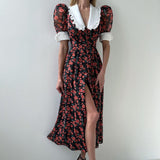 Rochie midi Solita negru din voal cu guler lat in V, maneci scurte, imprimeu floral