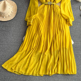 Rochie Hanelore galbena cu pliuri si curea accesorizata