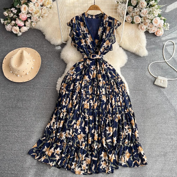 Rochie Gyda bleumarin cu imprimeu floral si curea accesorizata