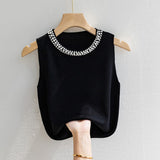 Top Kaelis din tricot cu perle la baza decolteului
