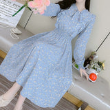 Rochie Silvy albastra cu imprimeu floral si decolteu accesorizat cu nod