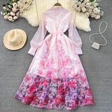 Rochie Finesse roz cu imprimeu floral si nasturi eleganti