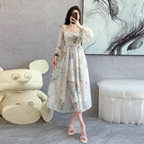 Rochie Fauna cu imprimeu floral si nasturi imbracati