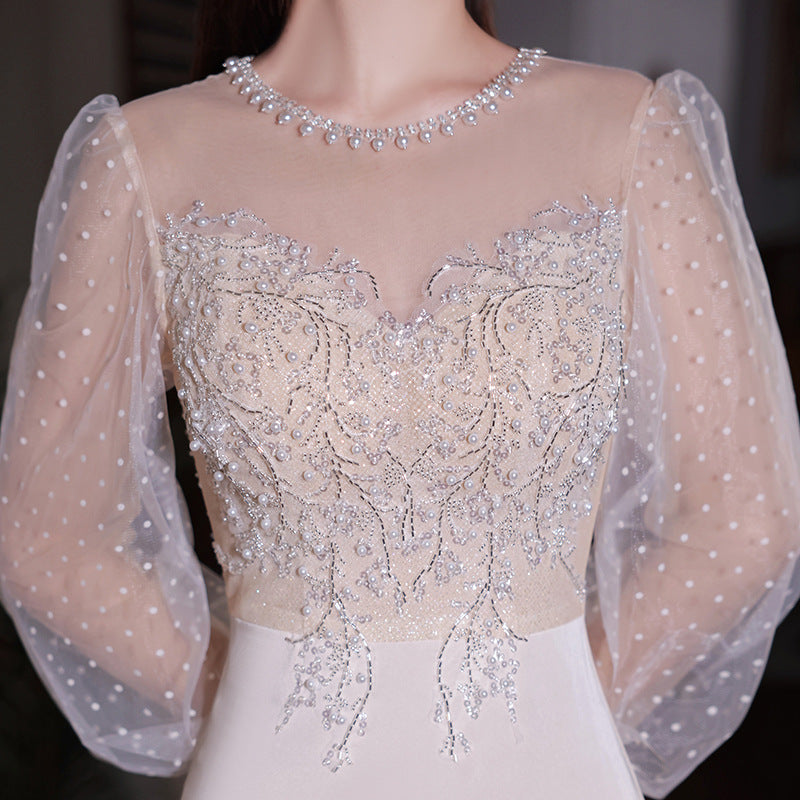 Rochie Havilah de eveniment cu maneci bufante si decolteu accesorizat cu perle