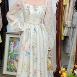 Rochie Fauna cu imprimeu floral si nasturi imbracati