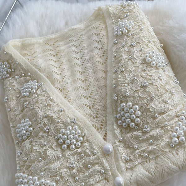 Jerseu Siana accesorizat cu perle si dantela