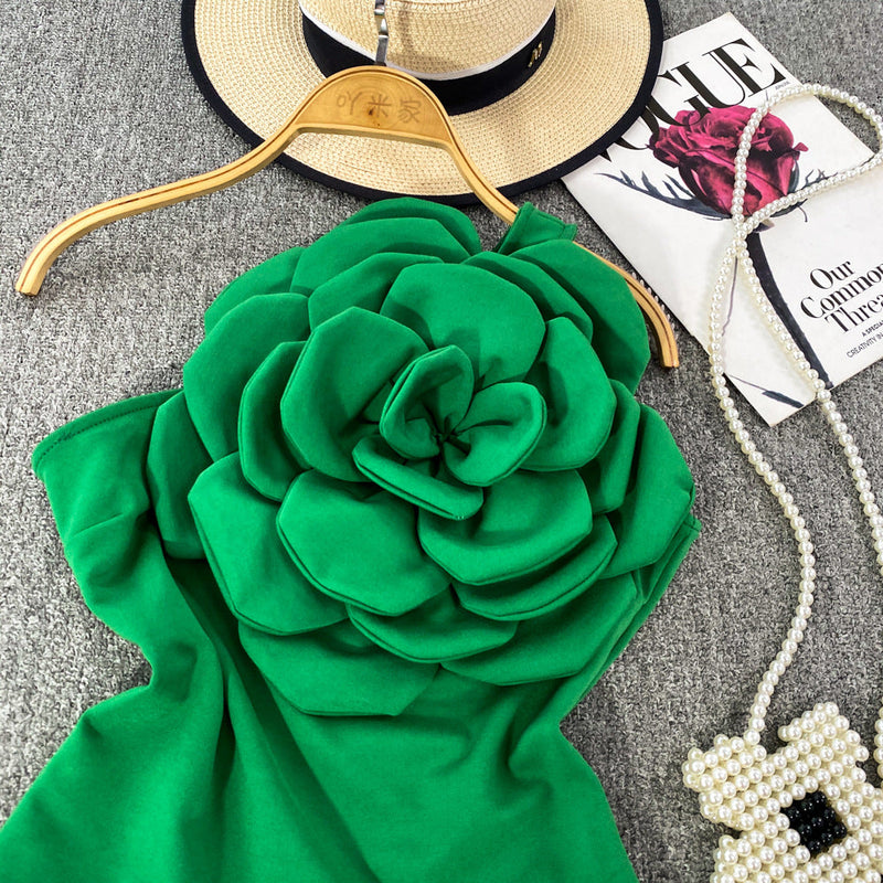 Top Cosima verde cu umar gol si floare tridimensionala