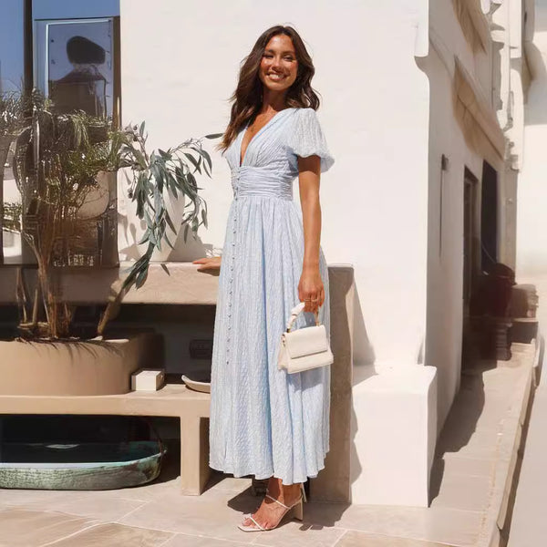 Rochie Ondine albastra cu maneci scurte bufante si material texturat