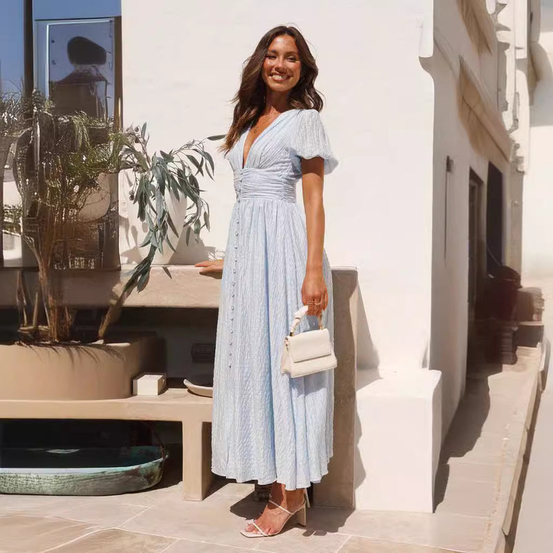 Rochie Ondine albastra cu maneci scurte bufante si material texturat