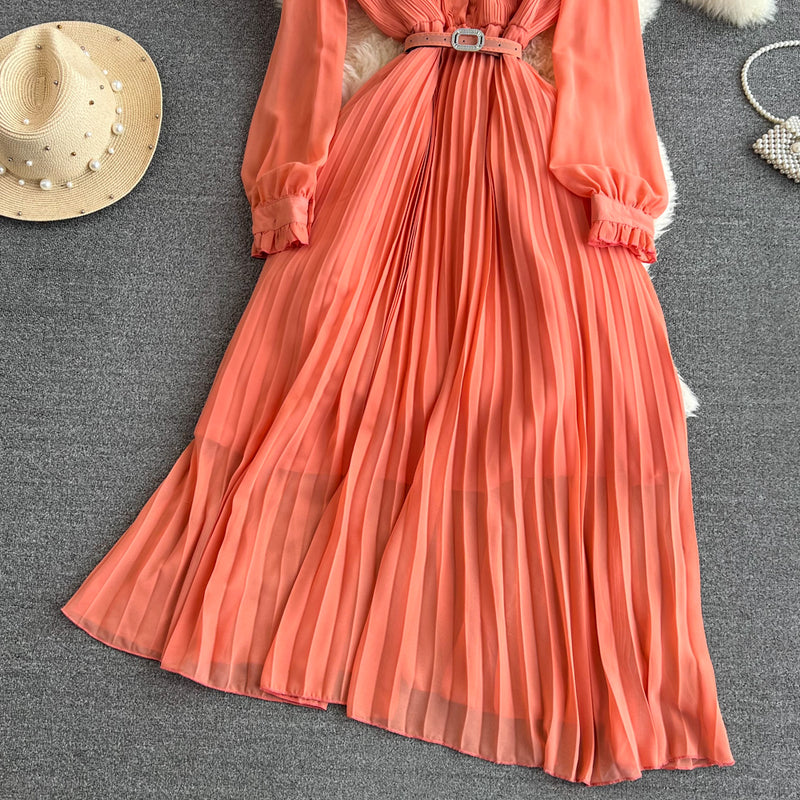 Rochie Hanelore portocalie cu pliuri si curea accesorizata