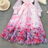 Rochie Finesse roz cu imprimeu floral si nasturi eleganti