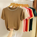 Tricou Zalys cu guler rotund decorat cu perle