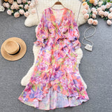 Rochie Gina portocalie cu decolteu in V si imprimeu floral