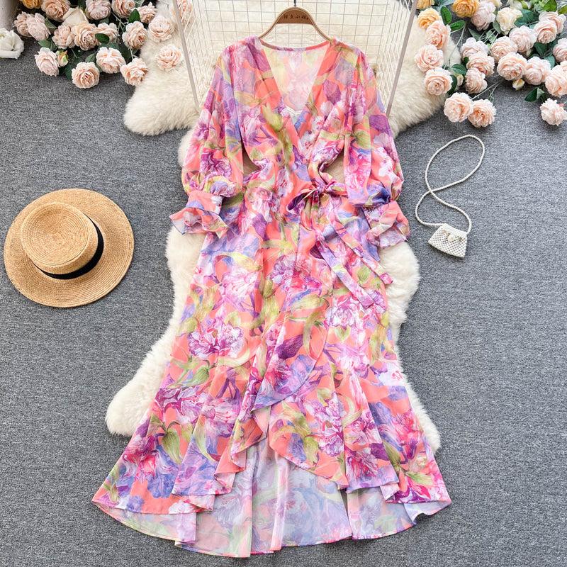 Rochie Gina portocalie cu decolteu in V si imprimeu floral