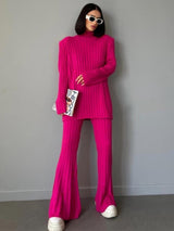 Compleu Dinnia roz compus din bluza si pantaloni din tricot reiat