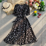 Rochie Arcelia neagra cu imprimeu floral si cordon accesorizat