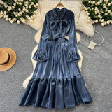 Rochie Favianne din material stralucitor cu decolteu reglabil prin funda