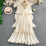 Rochie midi Aylora cu volanase si decolteu adanc