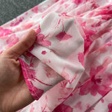 Rochie Brea roz cu nasturi imbracati si imprimeu floral