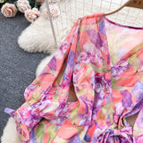 Rochie Gina portocalie cu decolteu in V si imprimeu floral