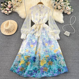 Rochie Finesse albastra cu imprimeu floral si nasturi eleganti