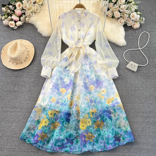 Rochie Finesse albastra cu imprimeu floral si nasturi eleganti