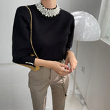 Bluza Ayana neagra accesorizata cu perle