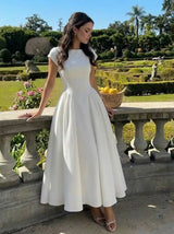 Rochie midi Christinne cu croi evazat si decolteu la spate