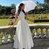Rochie midi Christinne cu croi evazat si decolteu la spate