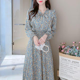 Rochie Silvy verde cu imprimeu floral si decolteu accesorizat cu nod