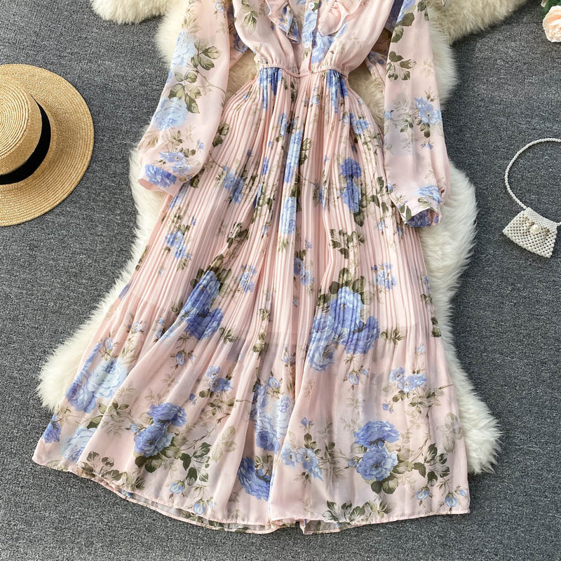 Rochie Miliona roz cu imprimeu floral si volanase